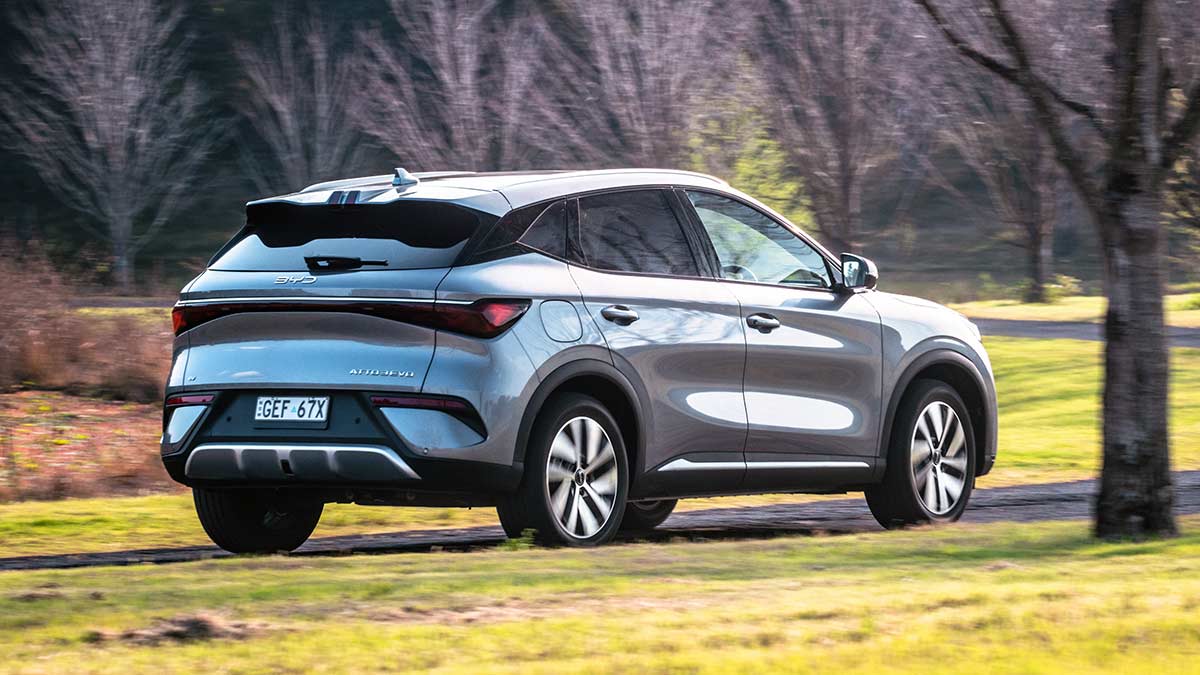 A Harbour Grey BYD Atto 3 Evo drives away from camera