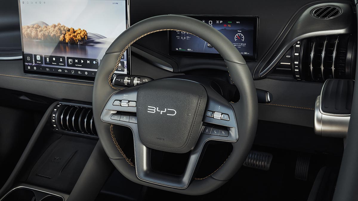 The steering wheel and controls of the BYD Atto 3 Evo