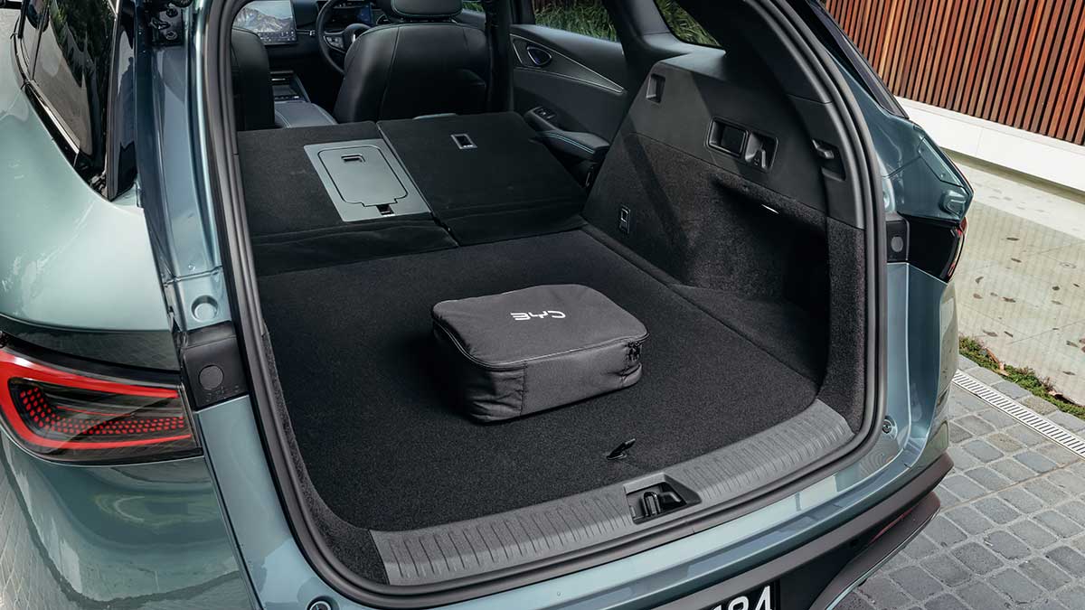 Cargo area of BYD Seal 6 Touring wagon with bag on floor and rear seats folded down.