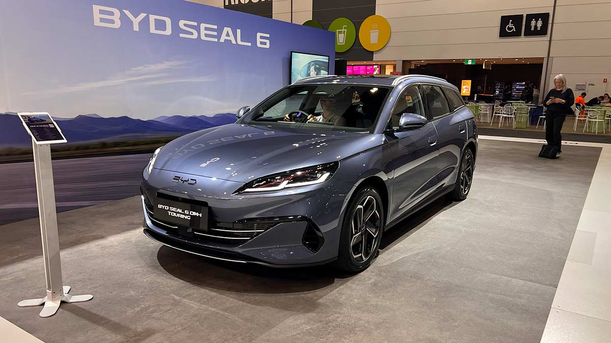 Front view of Atlantis Grey metallic BYD Seal 6 Touring wagon on display at Melbourne motor show.