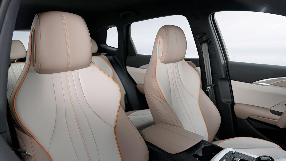 Two-tone cream and brown seat upholstery in cabin of BYD Sealion 5 SUV.
