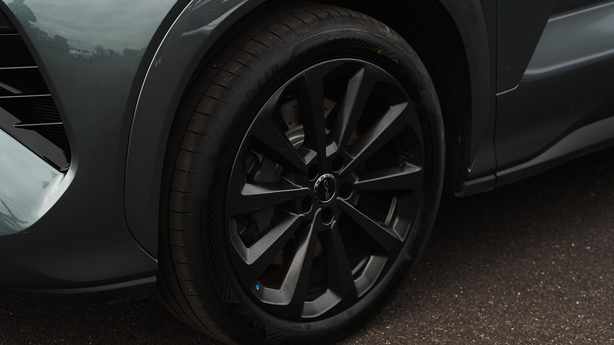Detail shot of BYD Sealion 8 Premium SUV’s black 21-inch alloy wheel and Goodyear tyre at front left of car.