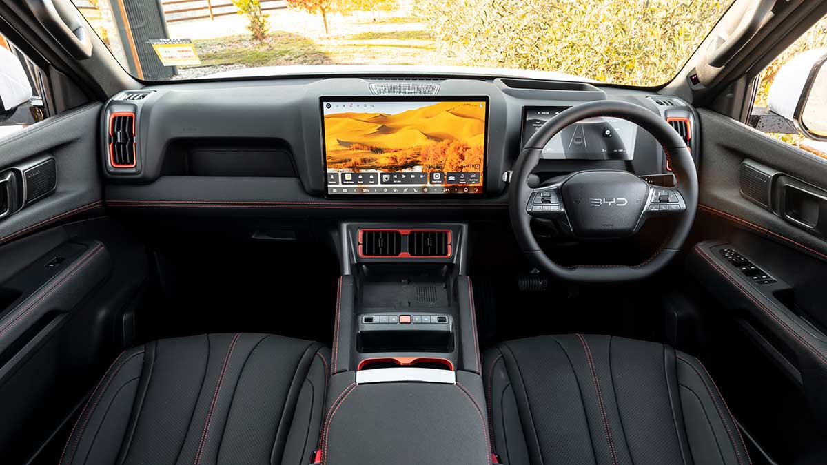 Dashboard of BYD Shark 6 Performance with large dual digital screens and new minimalist centre console.