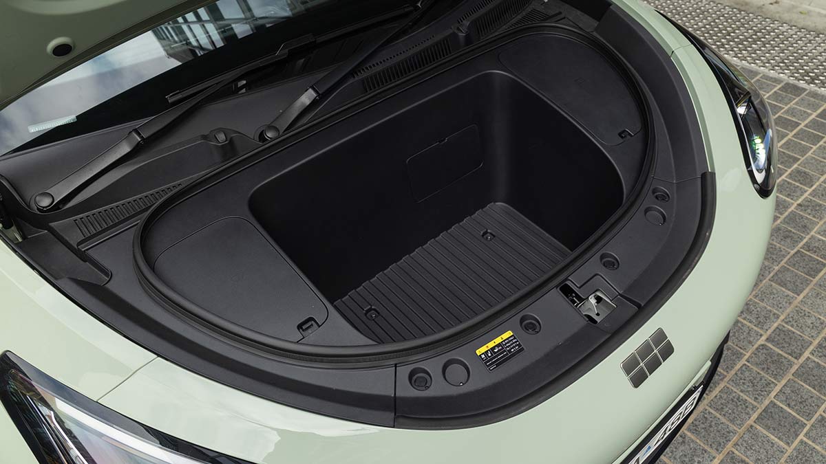 Overhead view of Geely EX2 electric hatchback's large 70-litre storage area under bonnet.