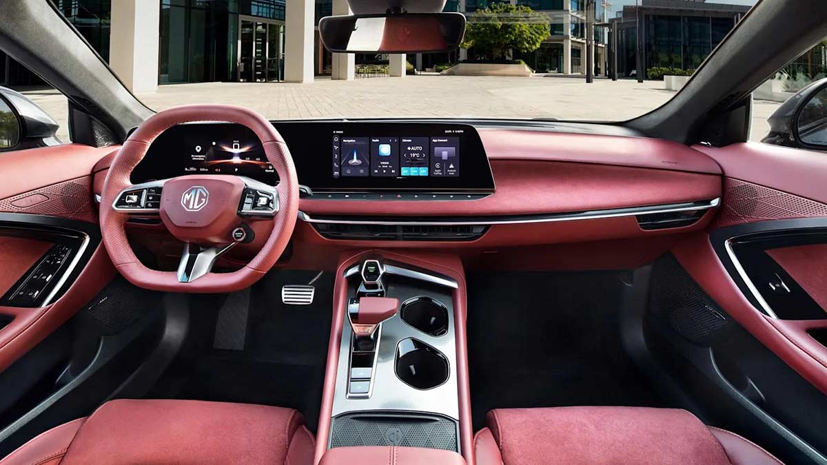 Dual central screens and red interior trim on seats, doors and dash of MG7 sports sedan.