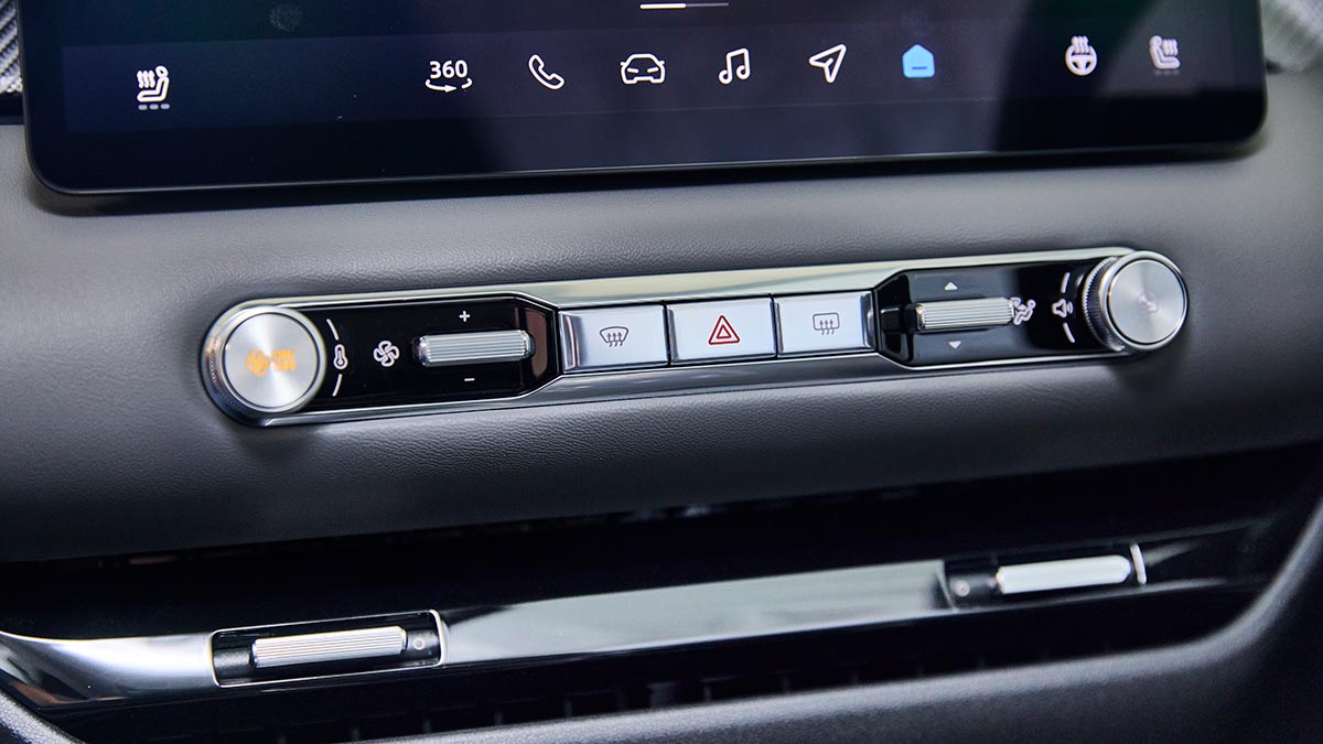 New line of switchgear below central touchscreen of MG4 EV hatch for climate and hazard lights.