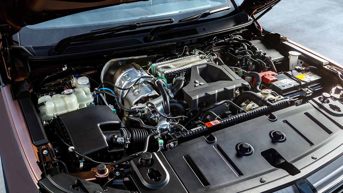Overhead view of twin-turbo diesel engine under bonnet of new Mitsubishi Pajero SUV.