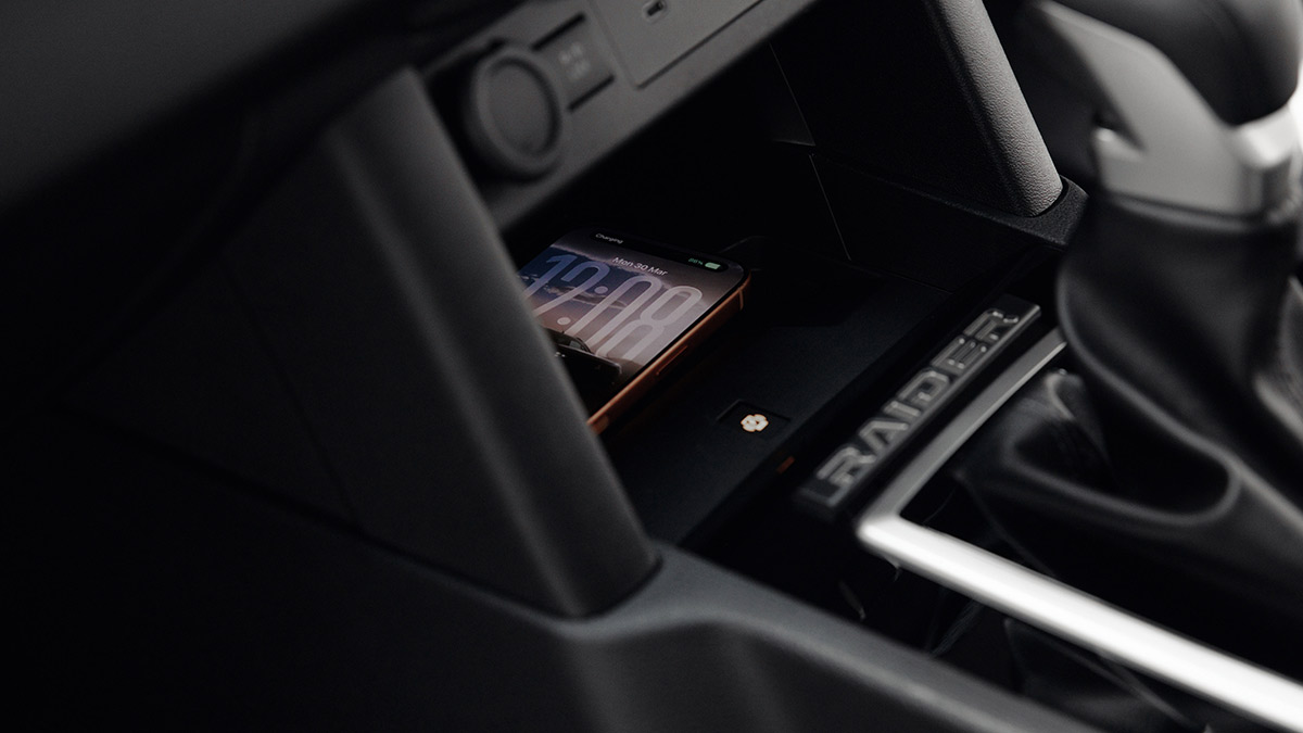 Raider badge on centre console of Mitsubishi Triton Raider ute.