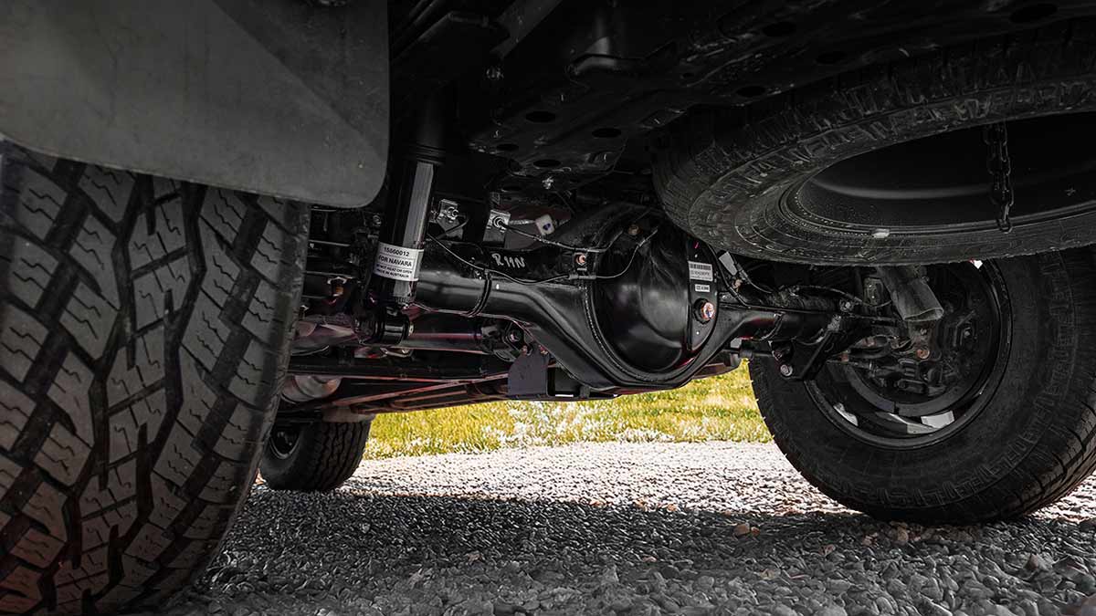Rear suspension underneath Nissan Navara ST-X with Australian-made Monroe shock absorbers.