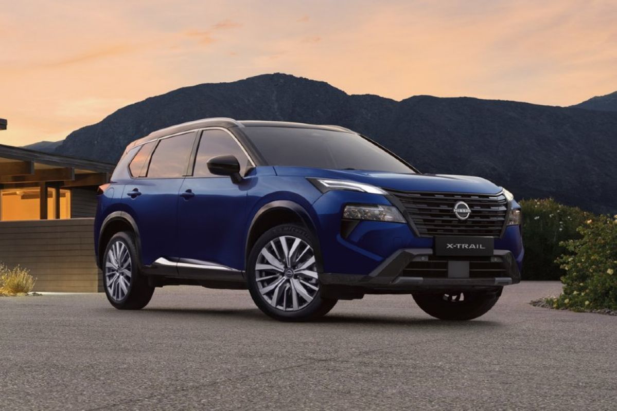 dark blue 2026 Nissan X-Trail parked on driveway