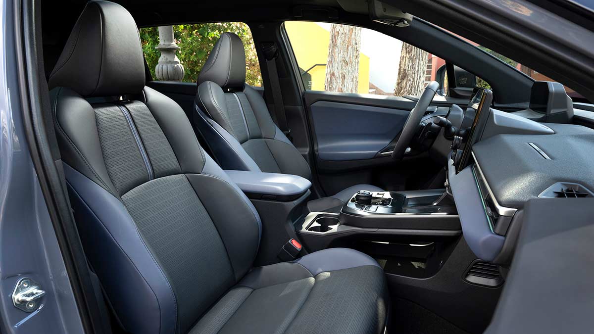 Interview front seats and console in 2026 Subaru Solterra electric vehicle.