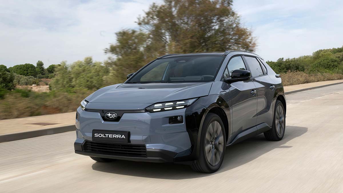 Exterior view of 2026 Subaru Solterra electric vehicle on road.