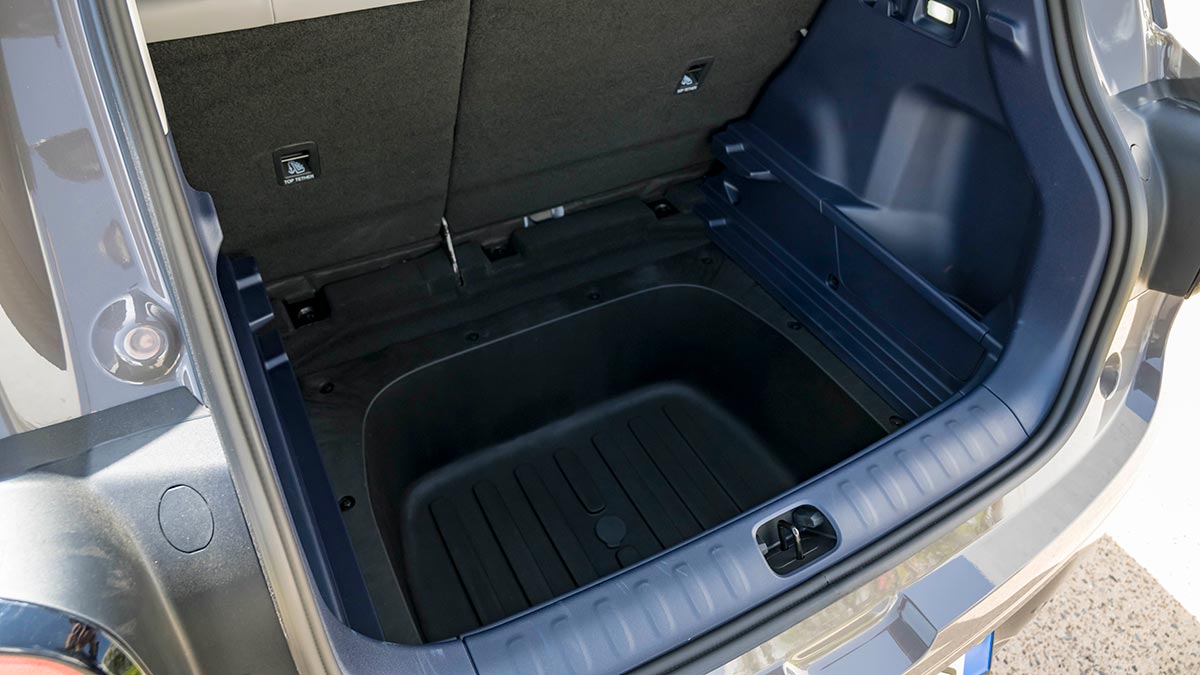 Cargo area in Leapmotor B03X small SUV with large storage bin below luggage floor.
