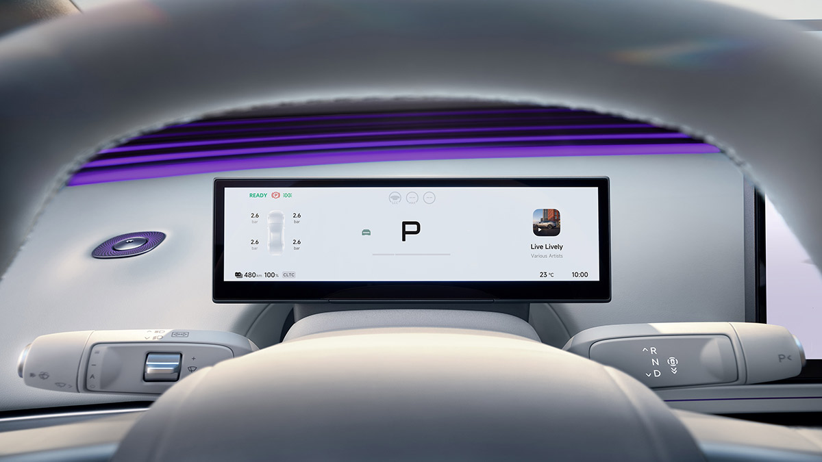 Narrow 8.9-inch digital driver’s display on XPeng L03, as seen through steering wheel.