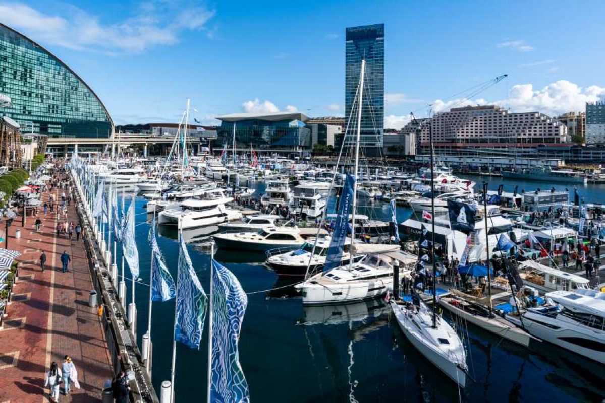 people exploring a boat show