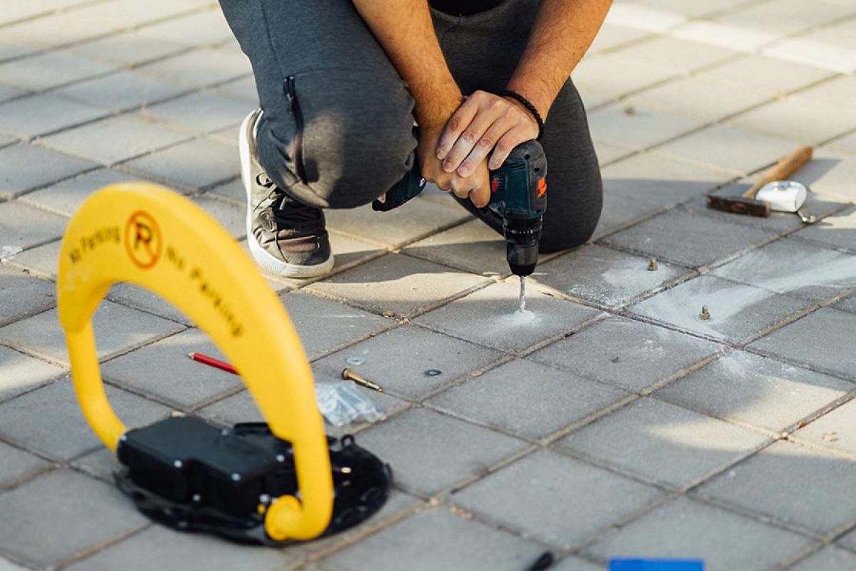 A red bar car steering wheel lock on a steering wheel