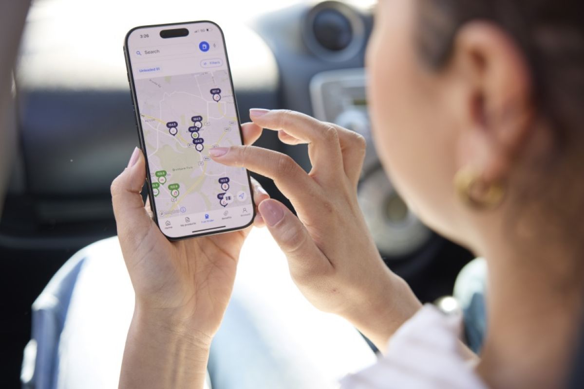 woman searching for fuel on RACV App