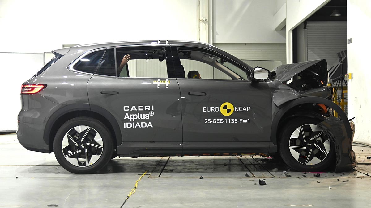 Grey Geely EX5 SUV with heavily damaged front end after hitting wall in Euro NCAP full-frontal crash test.