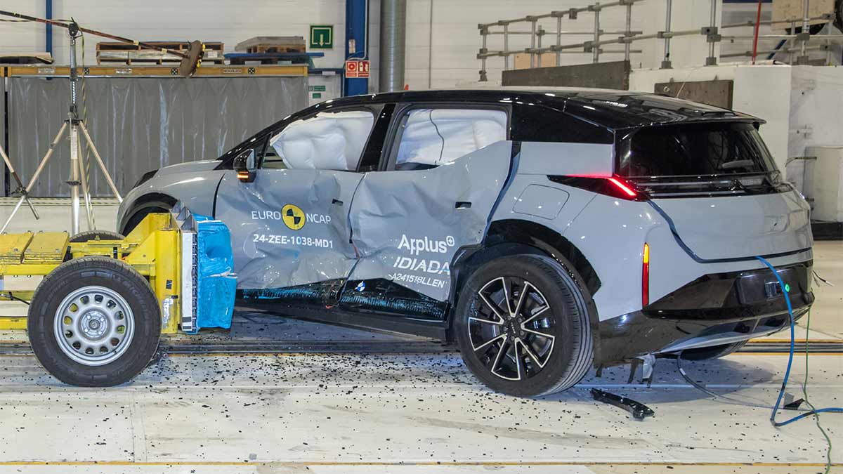 Blue Zeekr X SUV with heavily damaged side panels after hitting barrier in Euro NCAP side impact crash test.