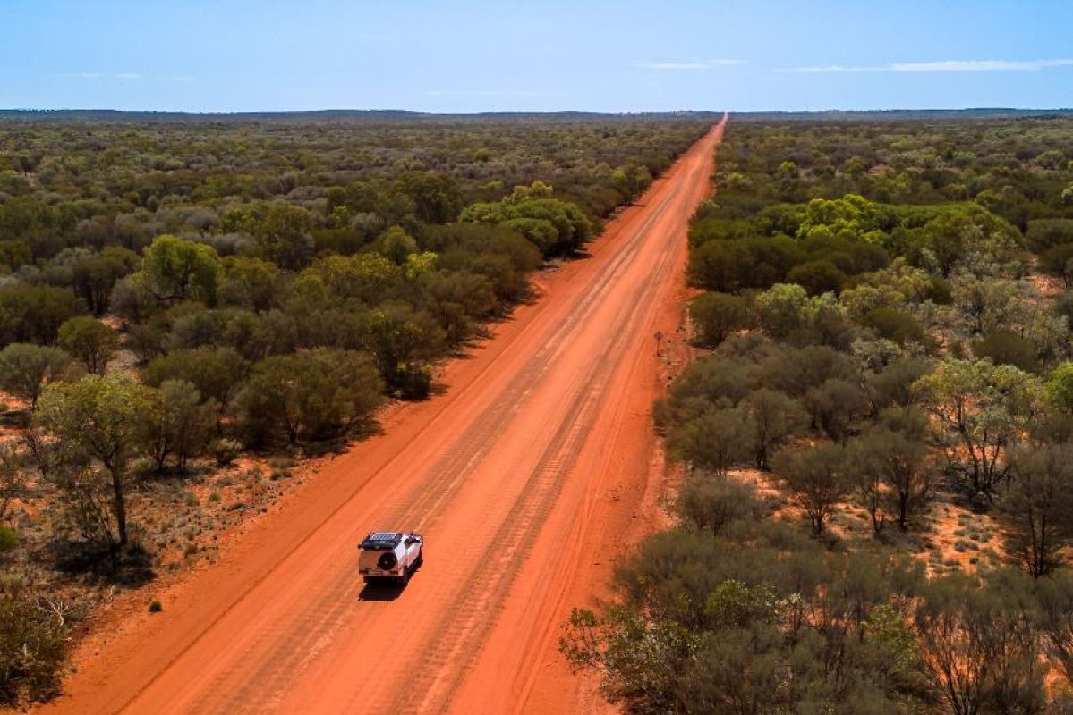 4WD on red dusty road in the outback