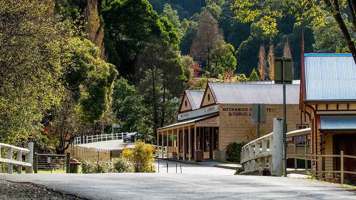 Walhalla streetscape with heritage buildings and tall trees