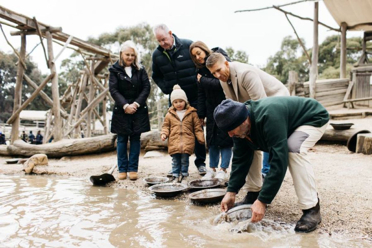 family panning for gold at Sovereign Hill