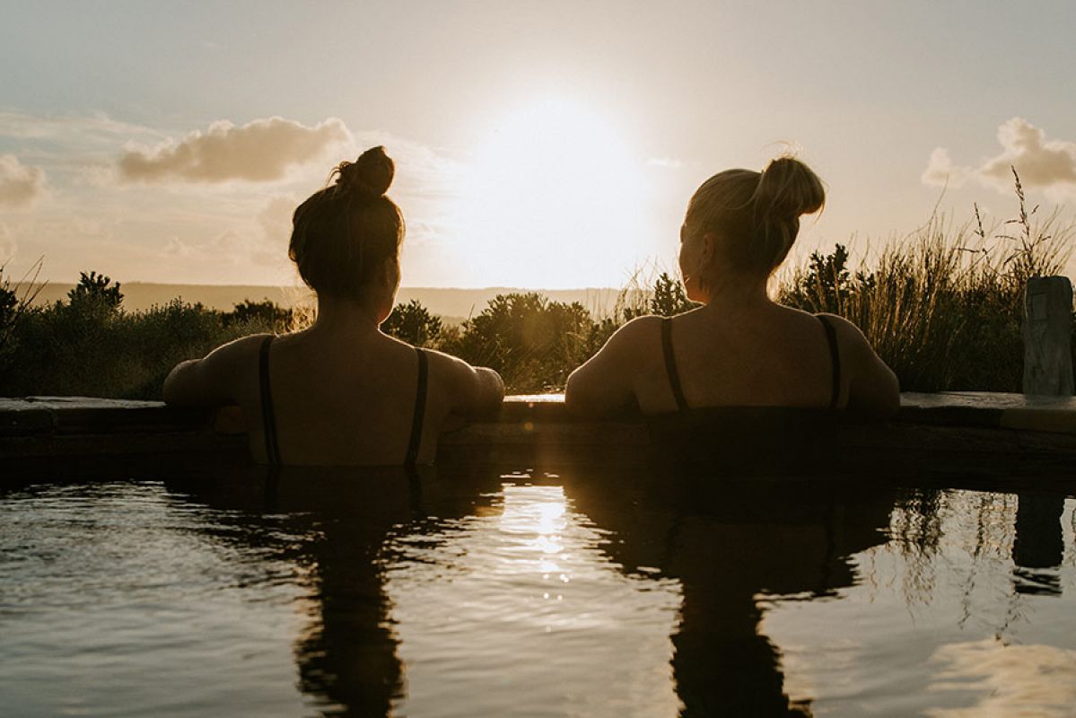 group of people bathing in a Peninsula Hot Springs pool