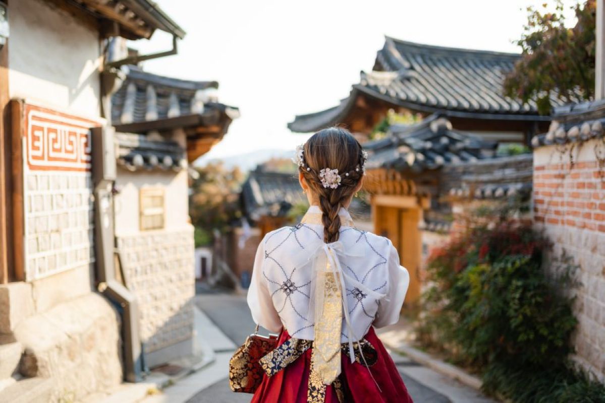 woman in Korean Hanbok traditional dress in Bukchon Hanok village