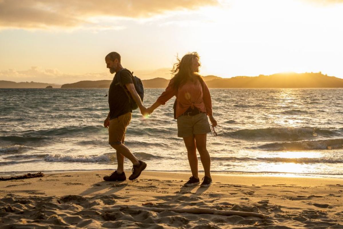 couple walking on beach