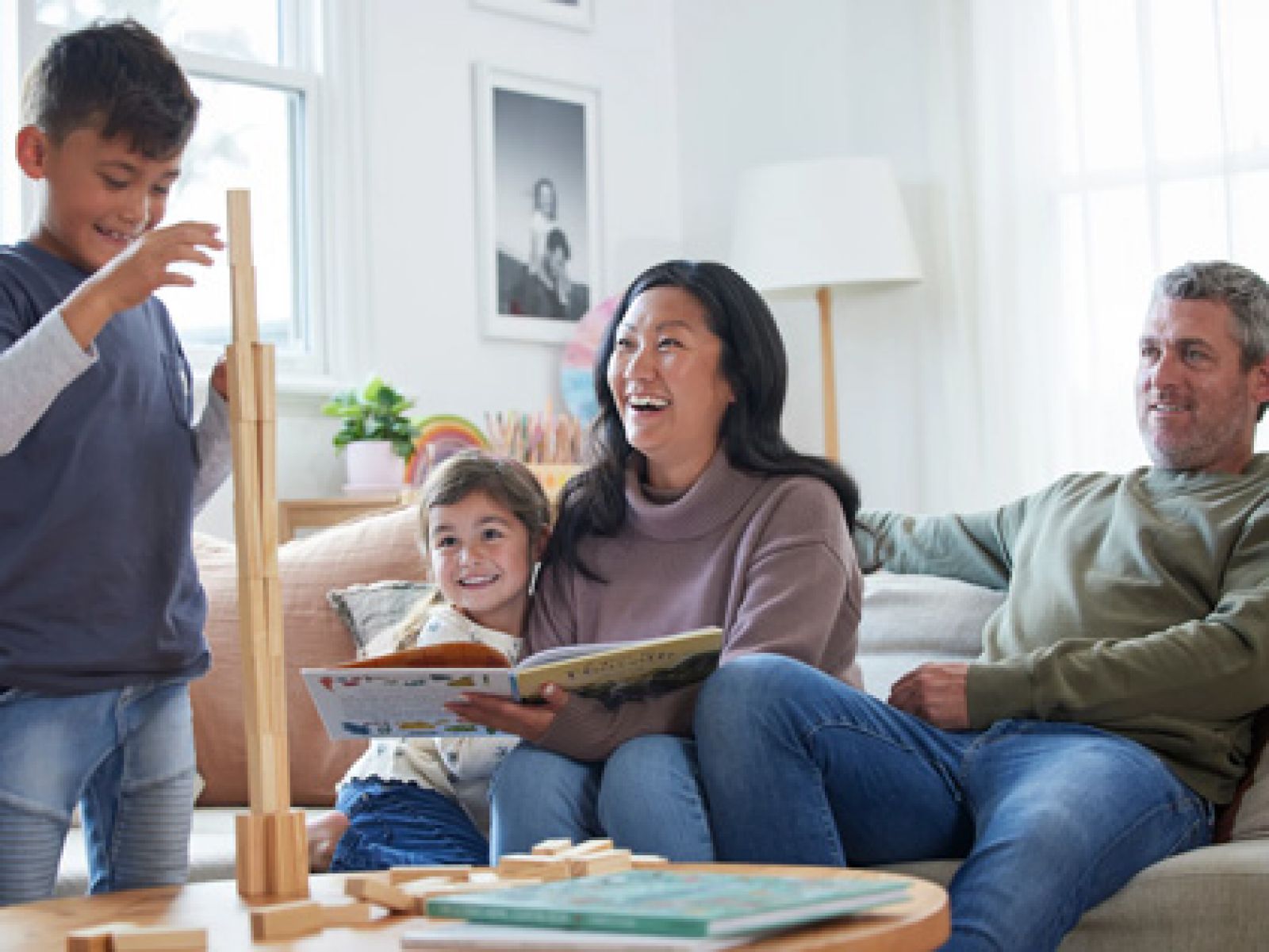 Family playing together in the living room
