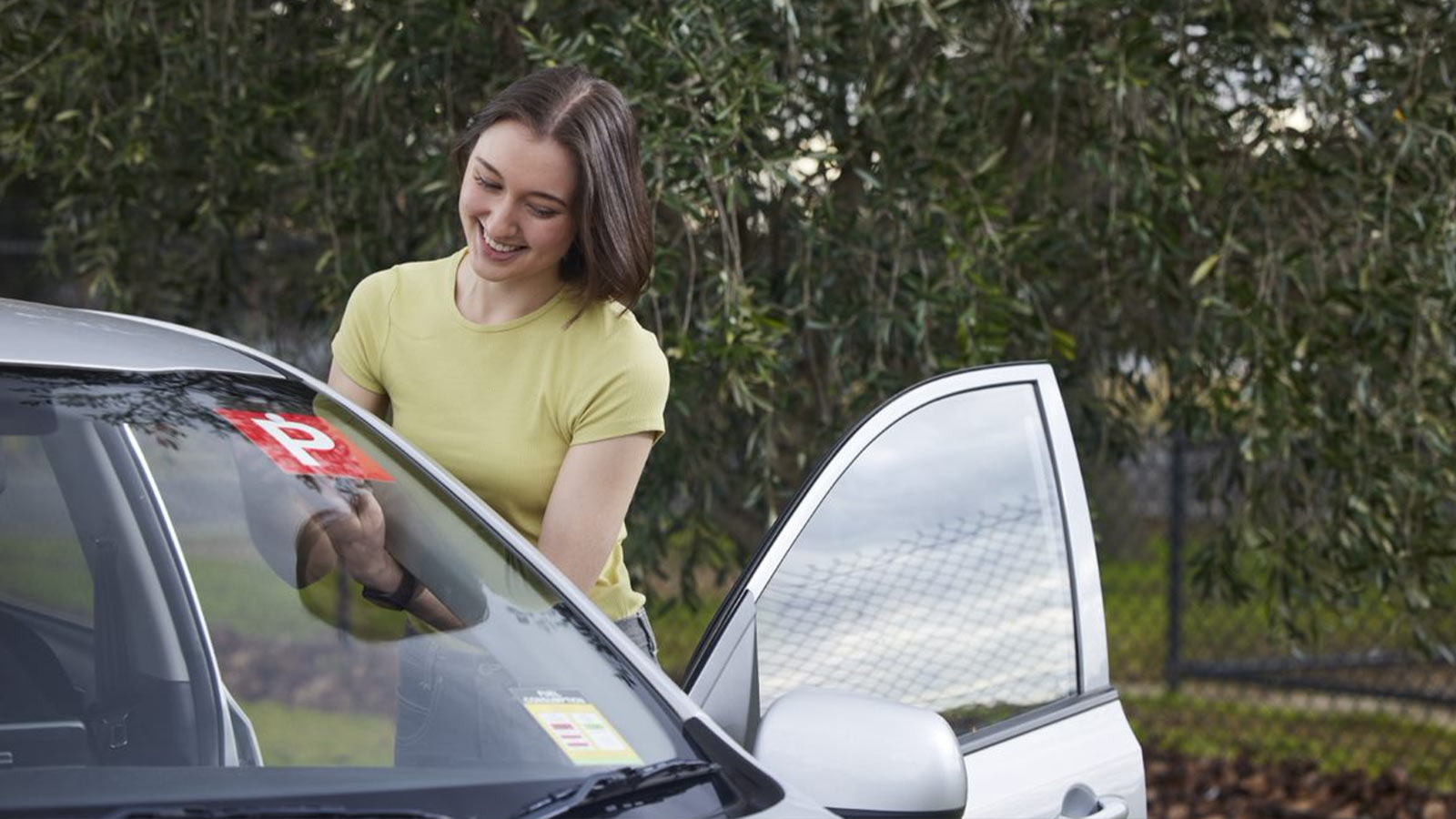 P Plater getting into the drivers seat of a car