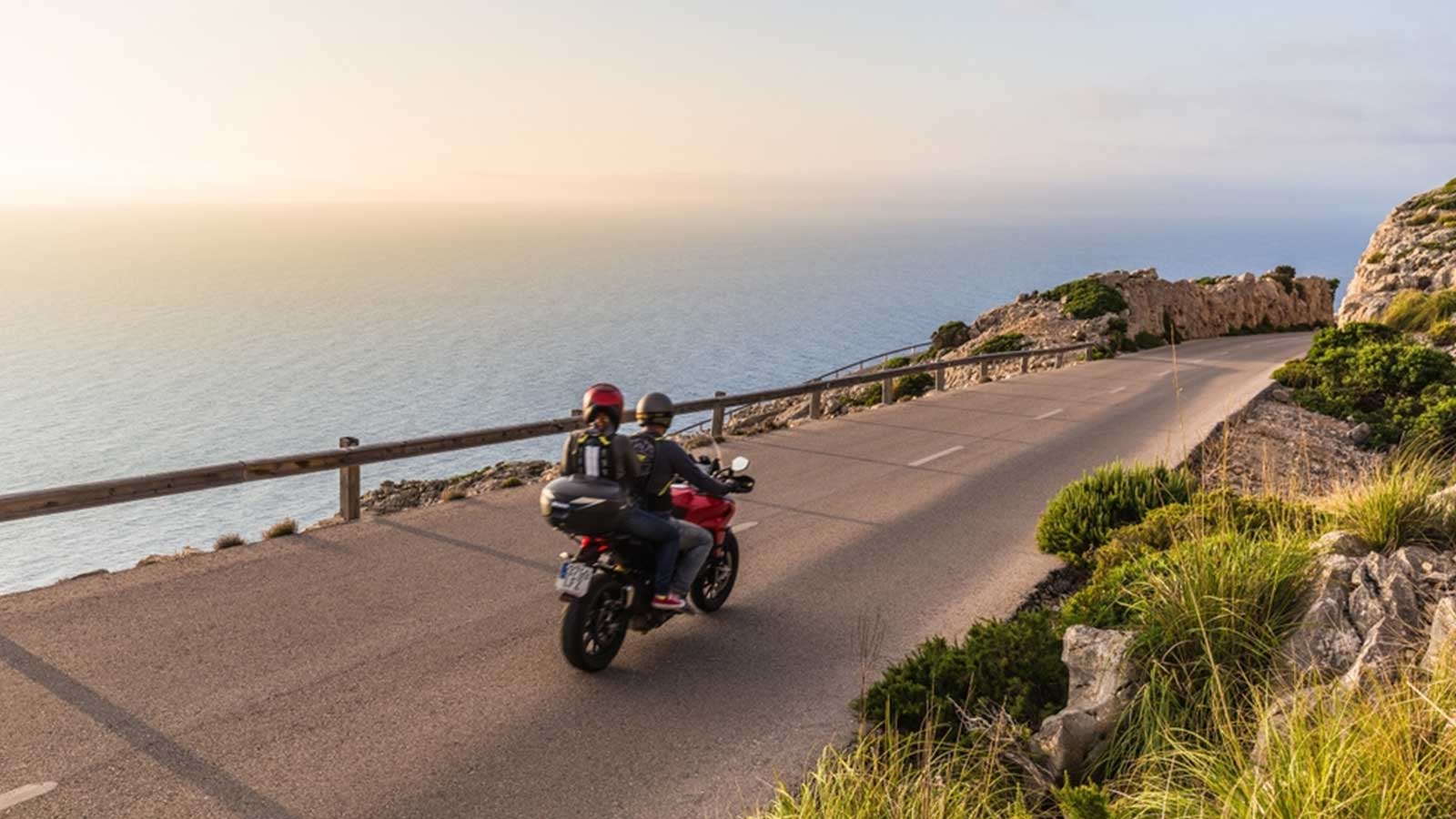 Motorcycle travelling on road