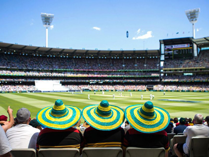 Fans watching the cricket at the MCG