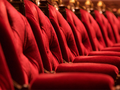 Red velvet theatre chairs.