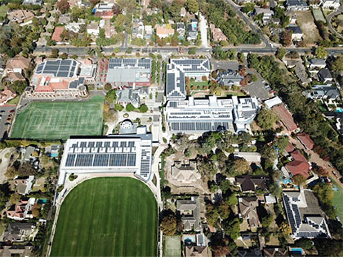 Aerial view of solar panels installed on Camberwell Grammar classroom buildings. 