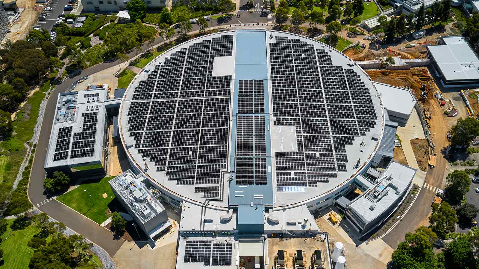 Aerial view of solar panels fitted on the roof of the Australian Nuclear Science and Technology Organisation.