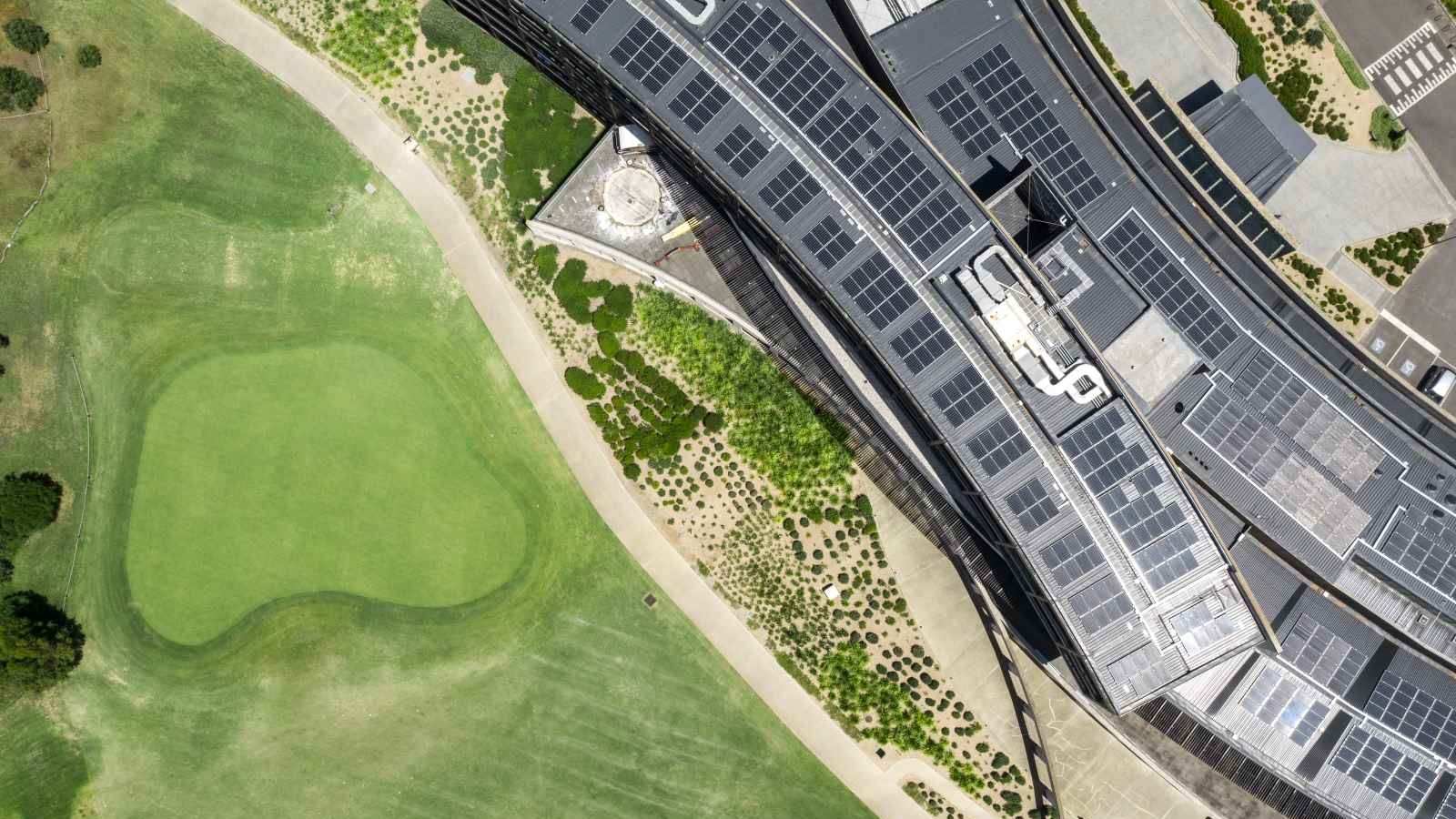Birds eye view of solar panels on large building