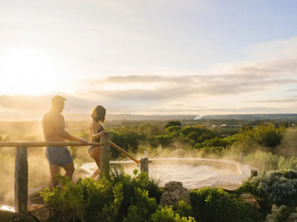 Couple going into a spa at Peninsula Hot Springs