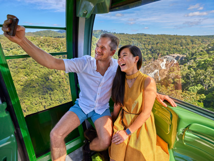 Couple riding the Kuranda Skyrail together