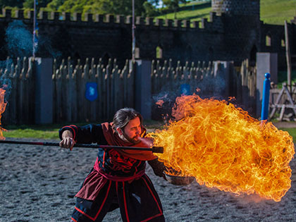 Fire dancer performing at Kryal Castle.