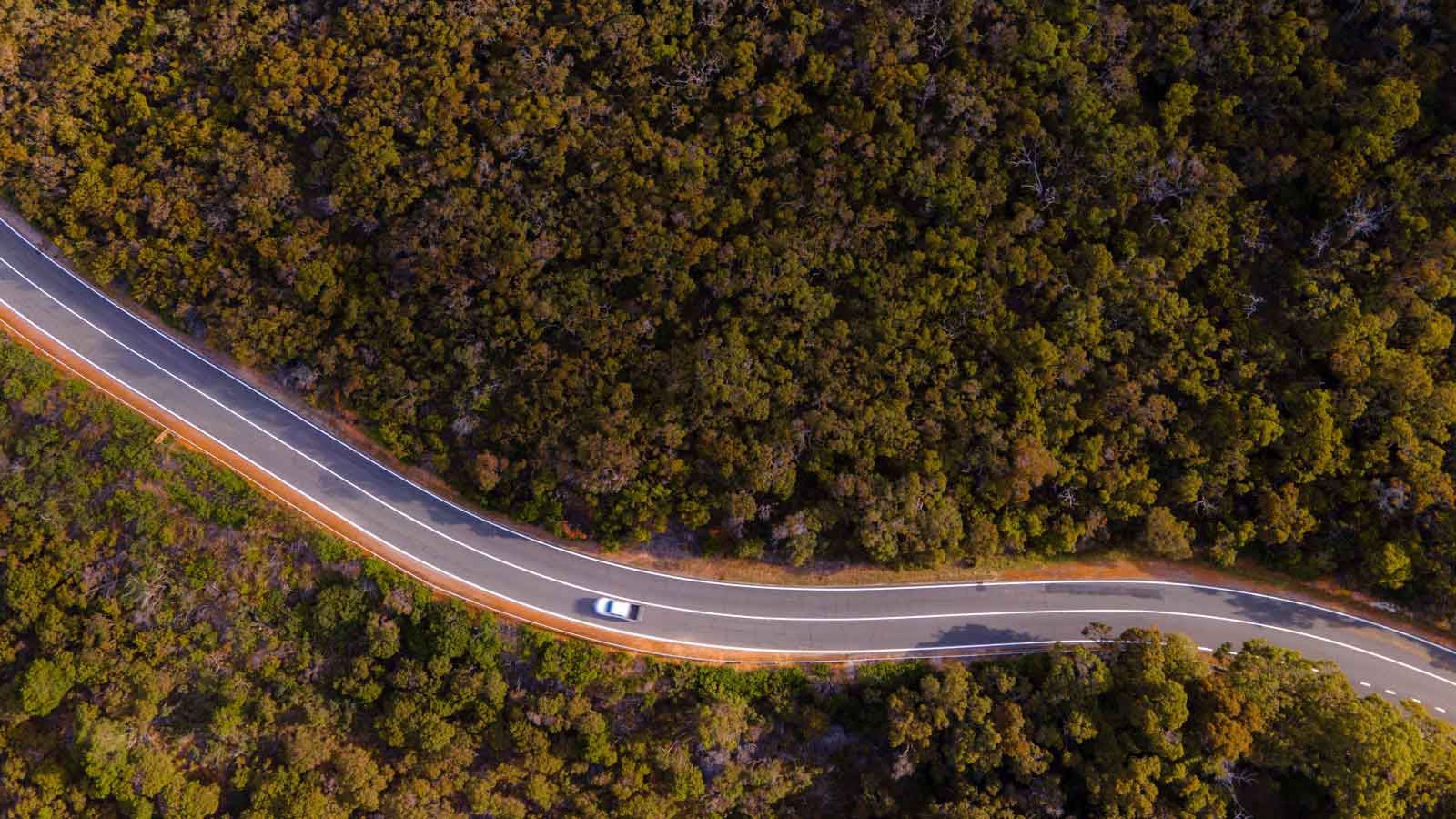Aerial view of a car driving through Albany, Western Australia