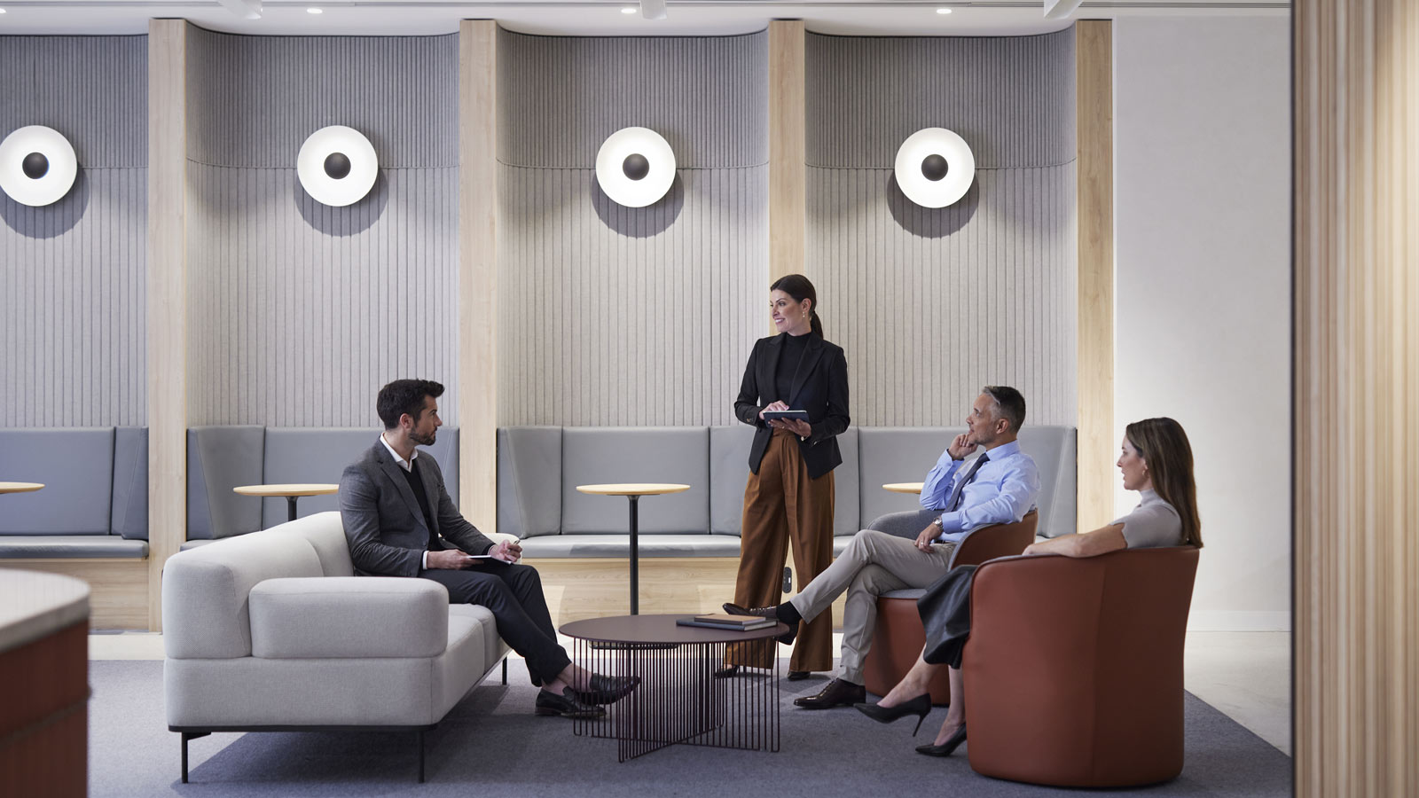 Colleagues having a meeting in the Shared Work Space