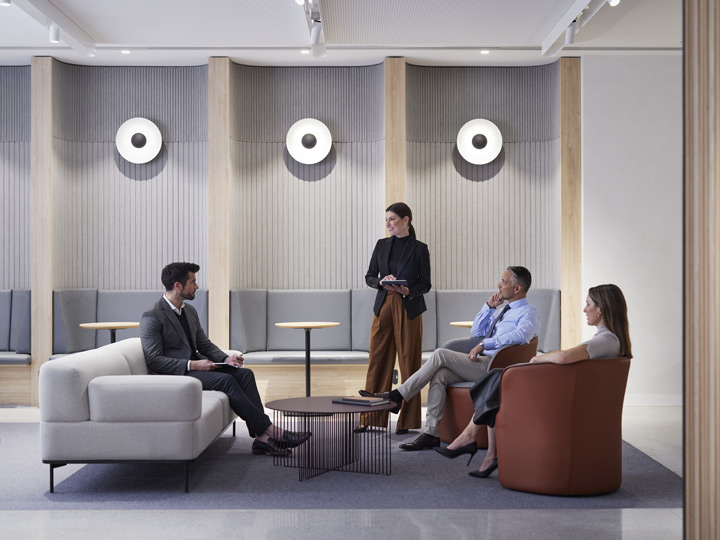 Colleagues having a meeting in the Shared Work Space
