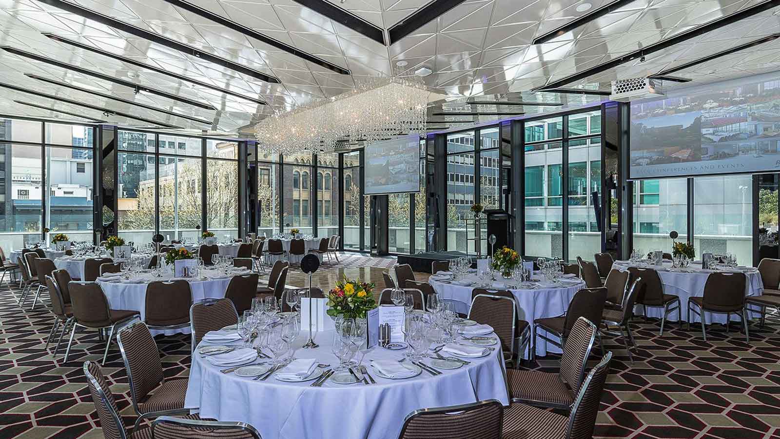 Cabaret tables set for dinner service in the Club Pavillion area.