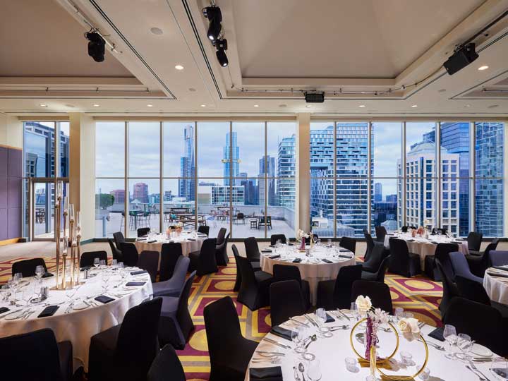 Level 17 function room with tables set up cabaret style with city views on the terrace.