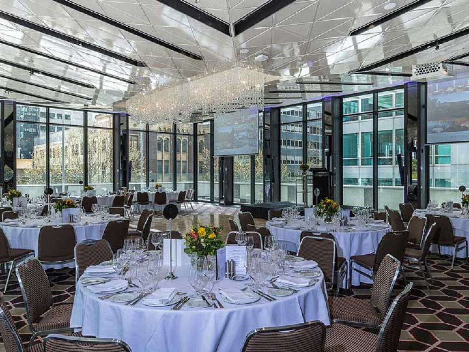 Cabaret tables set for dinner service in the Club Pavillion area.