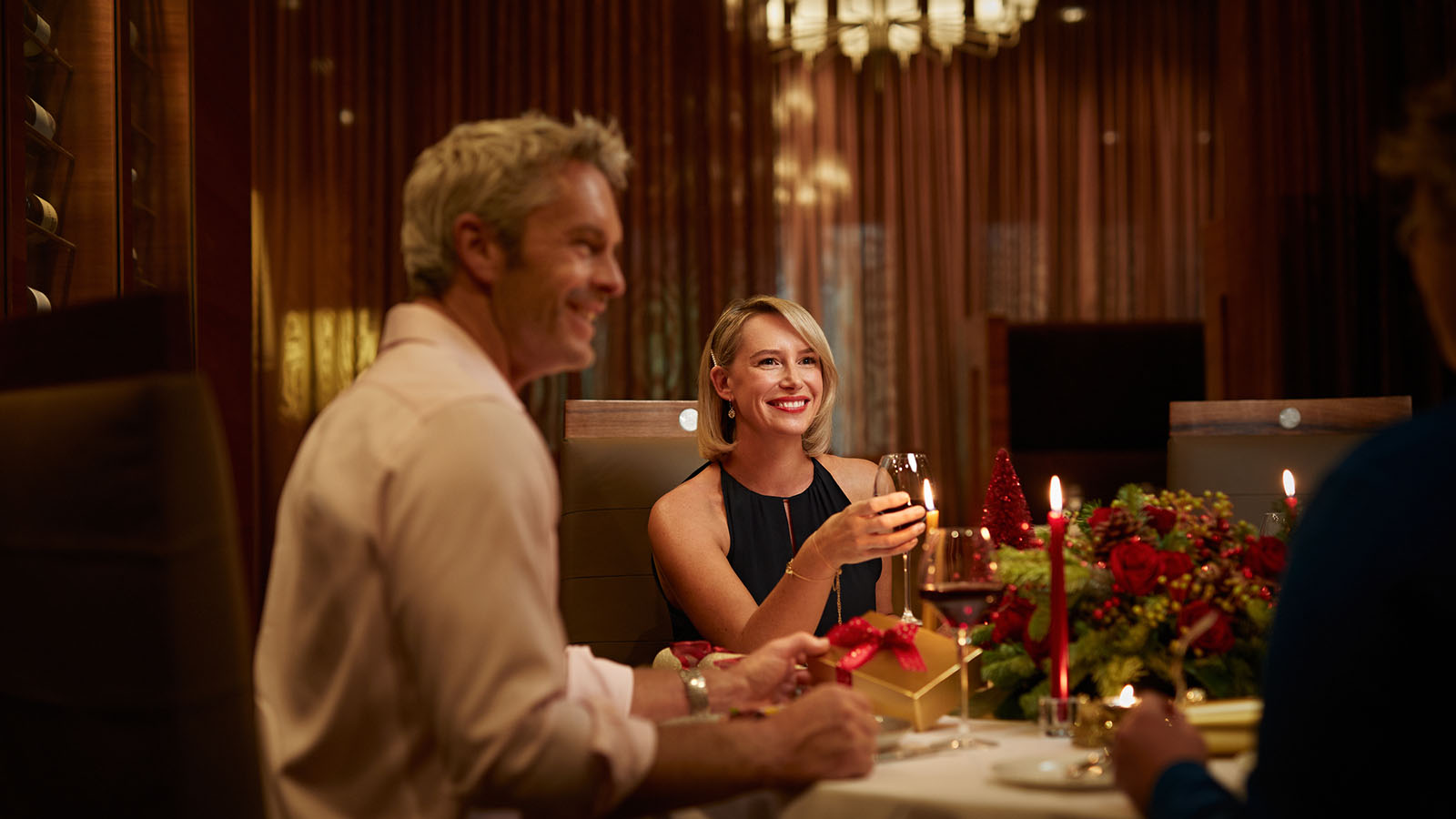 A couple toasting at the RACV City Club Members Lounge.