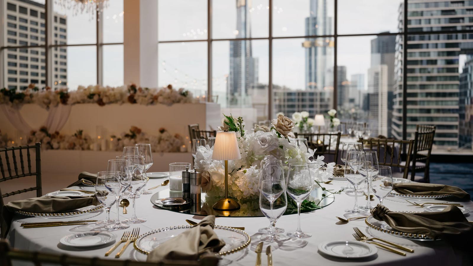 Table set banquet style for a wedding reception on Level 17