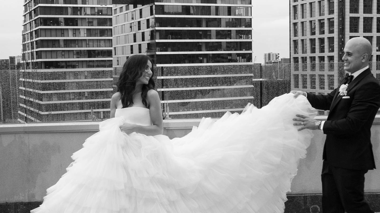 Couple taking photos on the Level 17 terrace