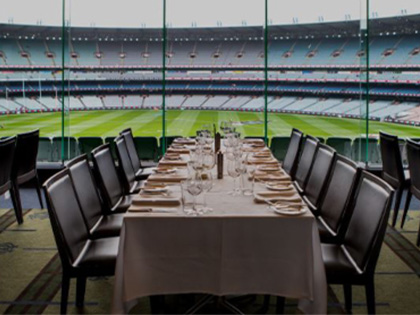 Dining table set with a view of the MCG